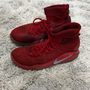 Nike Red Athletic Shoes with Silver Swoosh